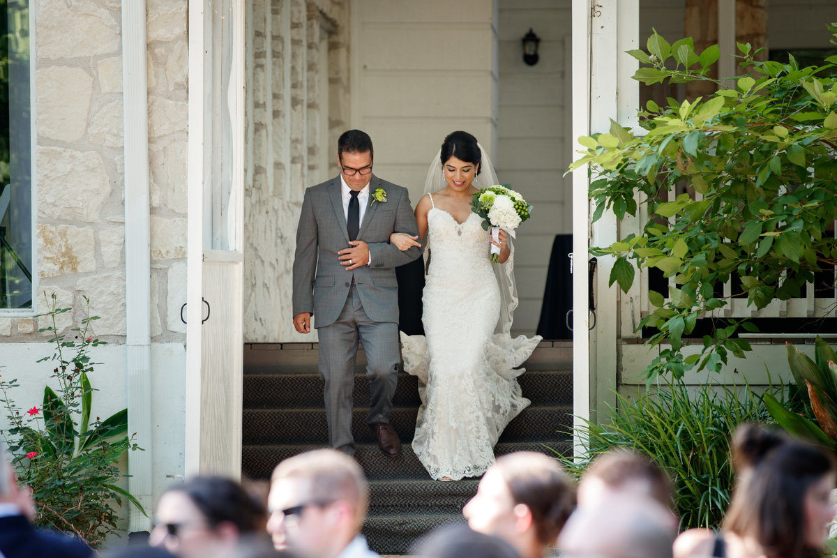 Austin wedding photographer casa blanca on brushy creek bride walking to alter