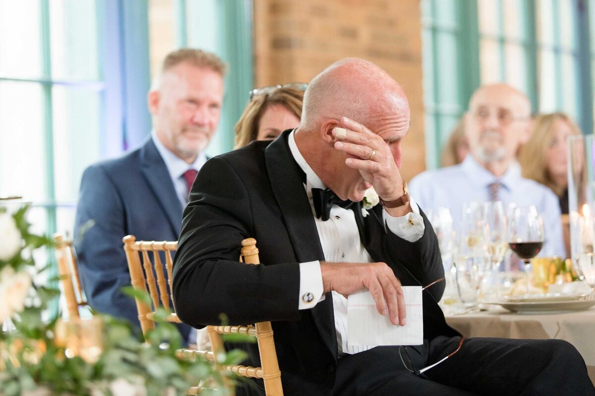 Father of the Bride sheds a tear during toasts during Luxury Chicago Outdoor Historic Wedding Venue.