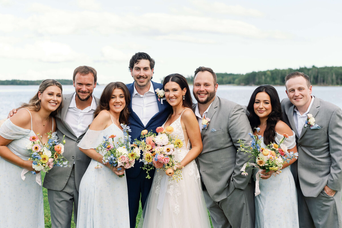 Bride and groom with bridal party at Oak Island Resort, Nova Scotia