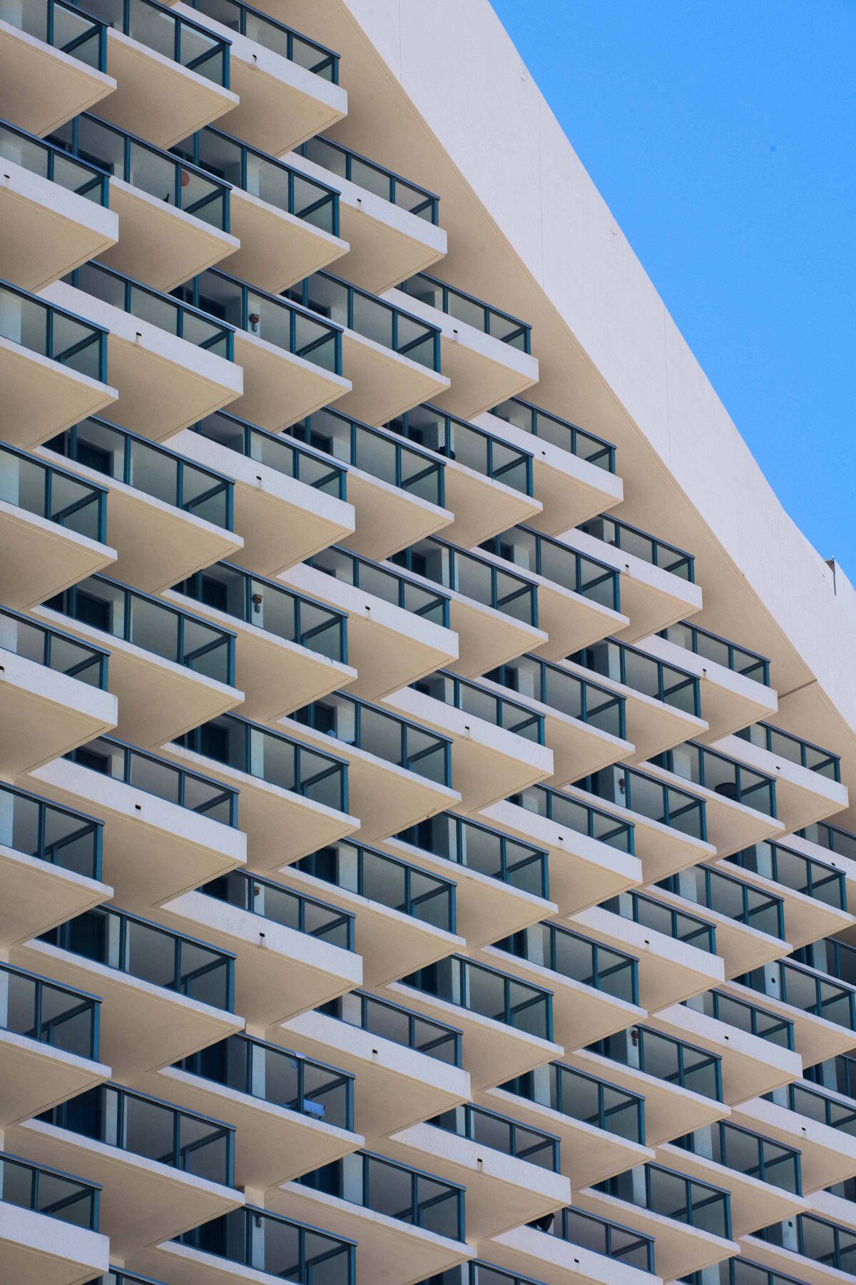 Balconies are shot showing geometric repetition in an artistic portrayal of the accommodations for guests