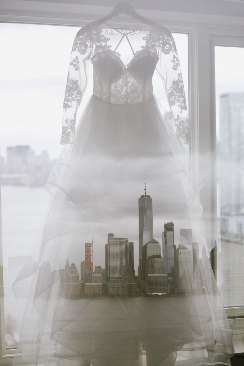 double exposure photography with the NYC skyline and a lace wedding gown