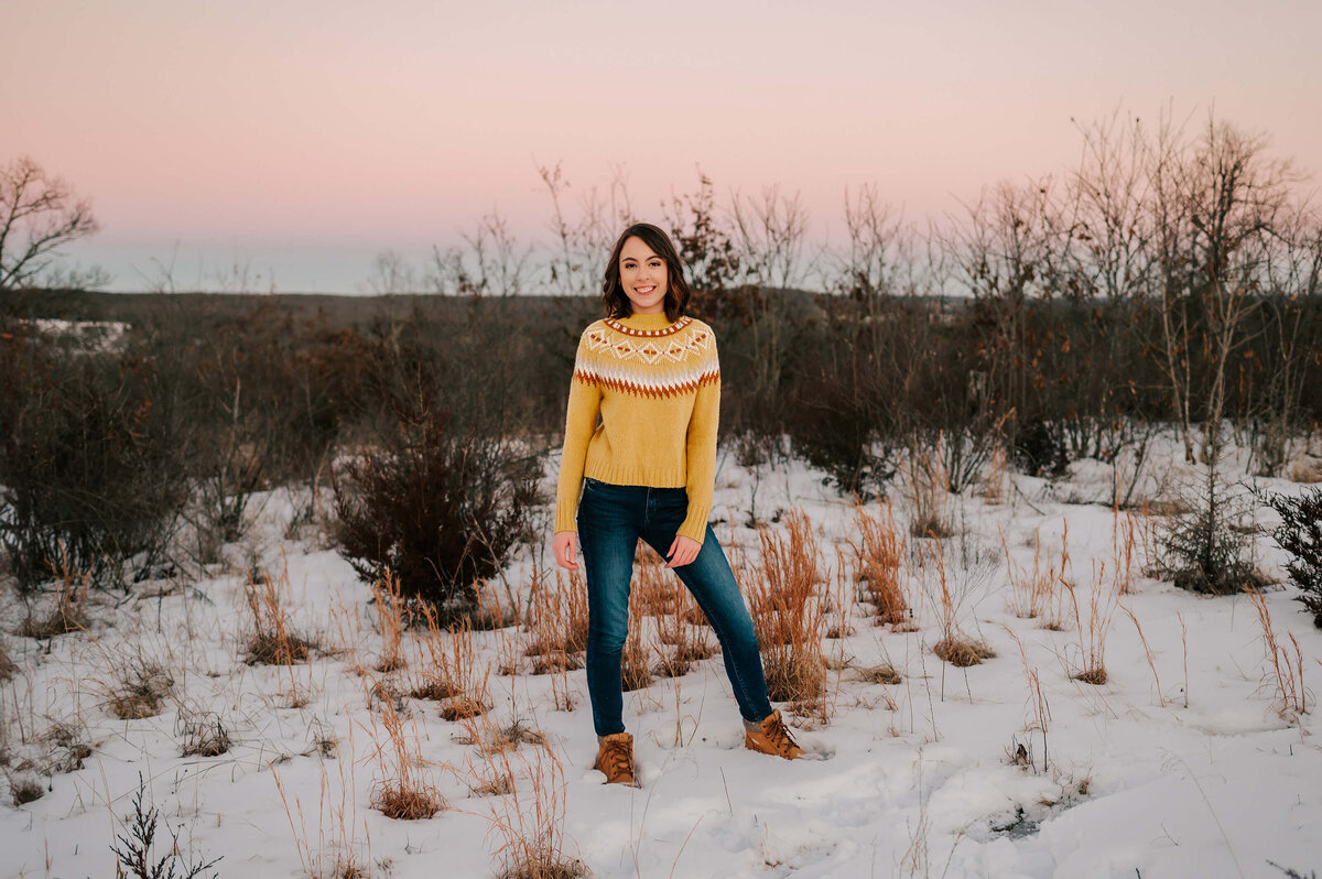 Springfield MO senior photographer Jessica Kennedy of The XO Photography captures senior girl standing in snow at sunset