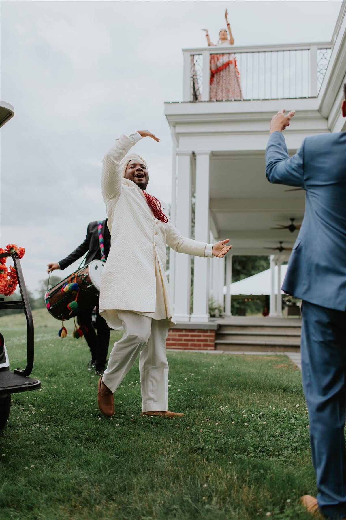 Barat with a golf cart at Ankony Carriage House with Hudson Valley Wedding Planner Canvas Weddings - 3