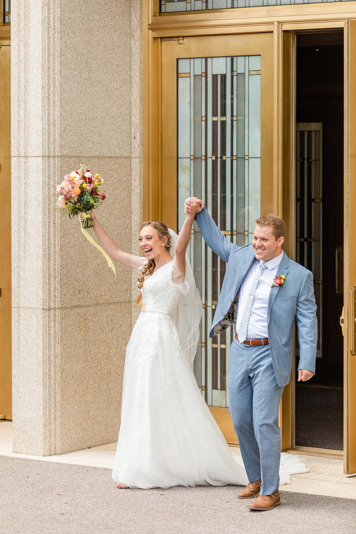 Utah temple wedding florist bride and groom.