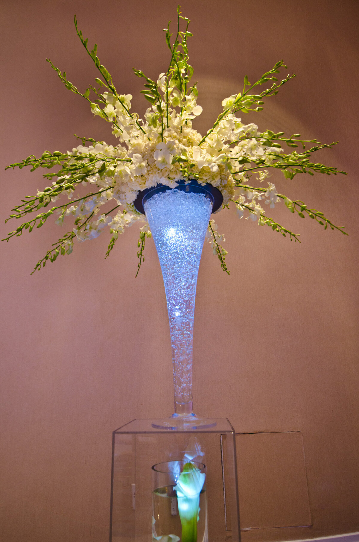 Elegant floral centerpiece in a luxurious sparkly vase