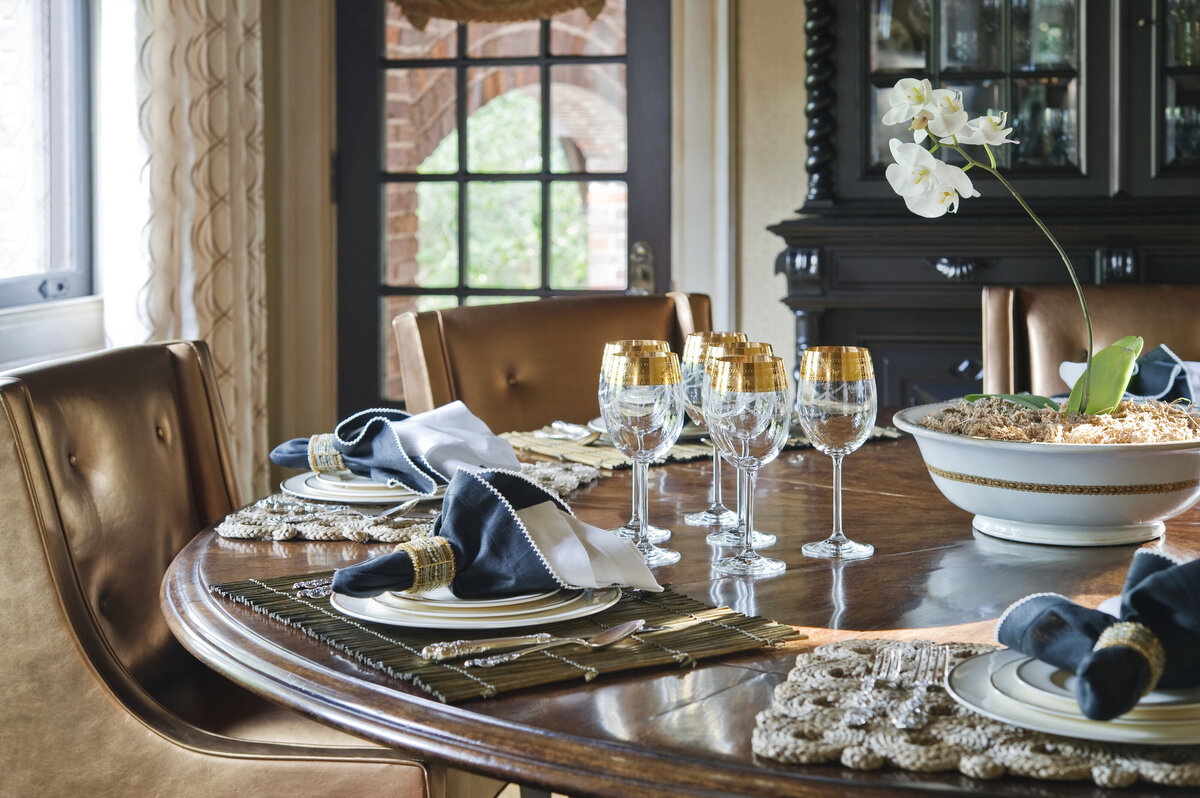 Panageries Residential Interior Design | Tudor Revival Estate Formal Dining Tablescape with wine glasses, cloth napkins, and place mats