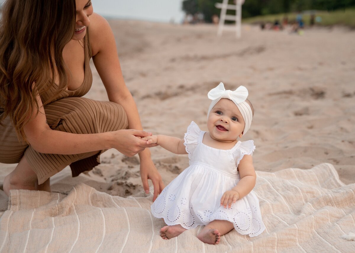 Playing with Newborn at Beach