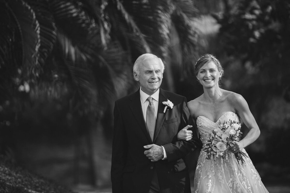 bride walking the aisle with her dad during a sayulita mexico wedding