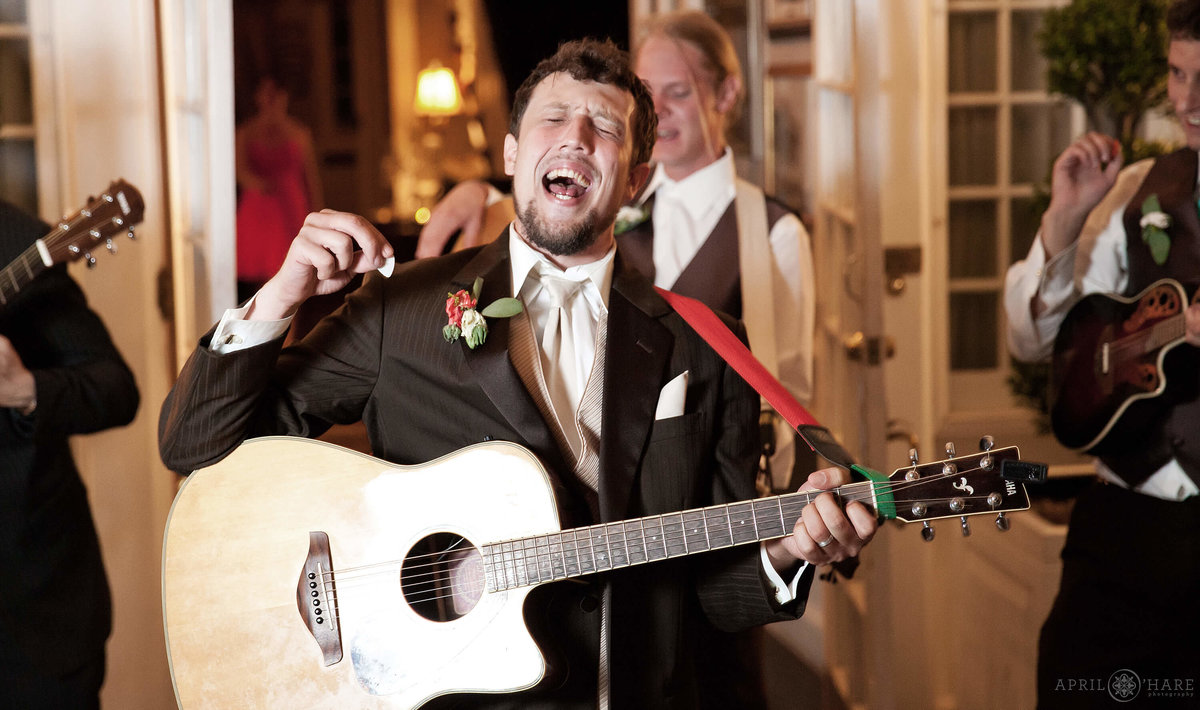 Groom singer in a band at The Manor House in Littleton Colorado
