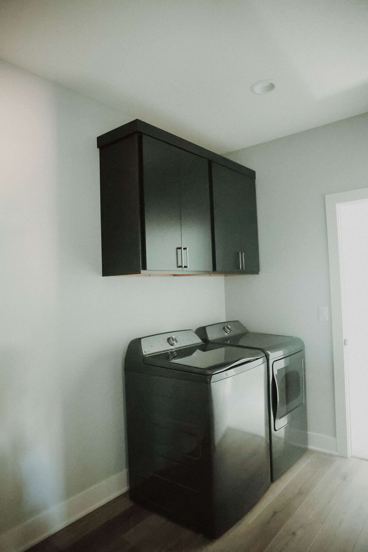 6907-Laundry-Panora-Central-Iowa-Custom-Home-JRL-Builders-E23A9473