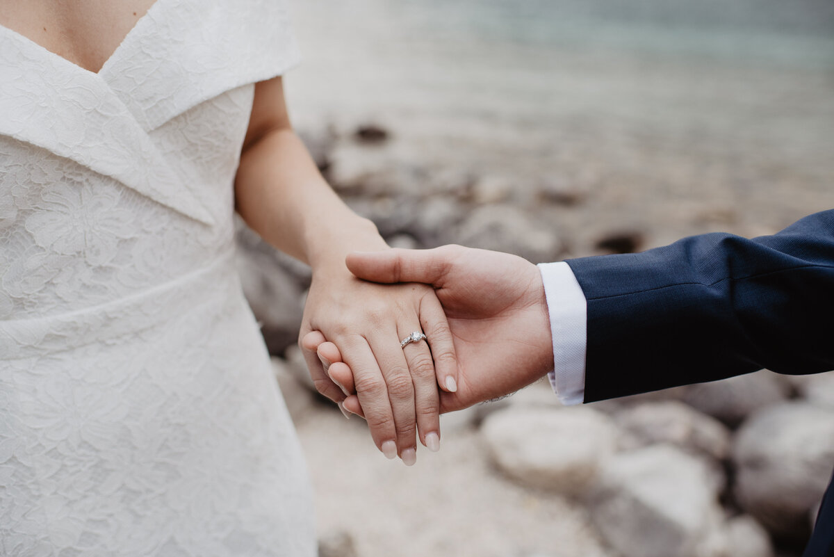 Photographers Jackson Hole capture bride and groom holding hands