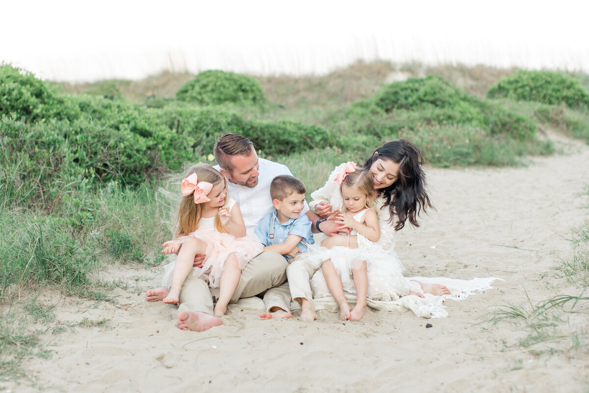 Family of five poses on the Isle of Palms, South Carolina
