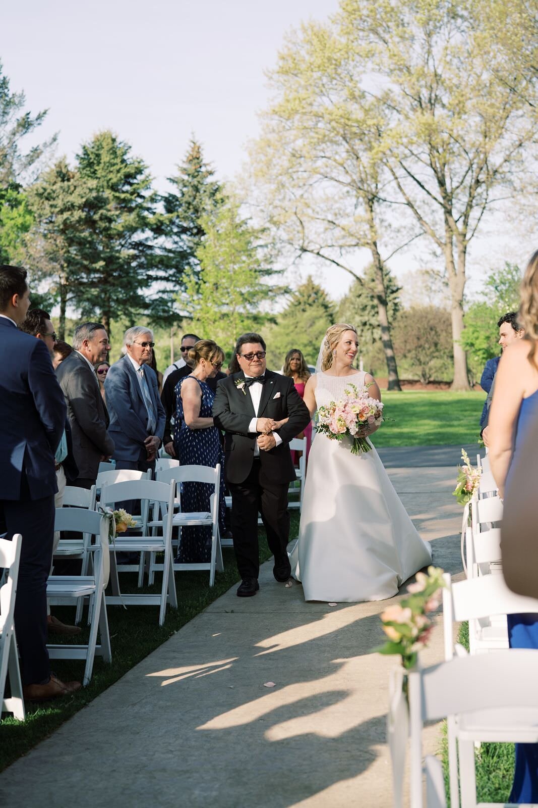 bride-walking-down-aisle-sarah-sunstrom-photography-monte-bello-estate-wedding
