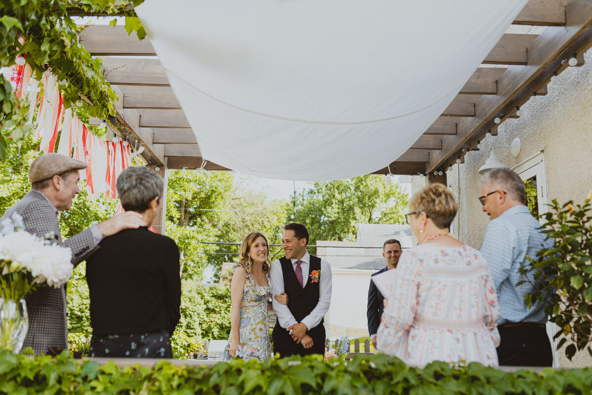 intimate covid ceremony in couples backyard