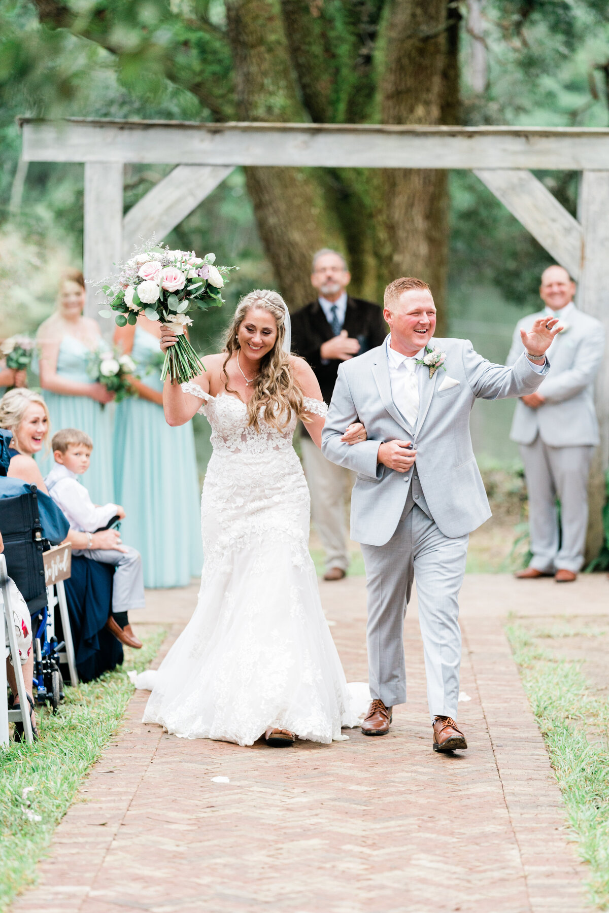Bride and groom walking down aisle in Alabama