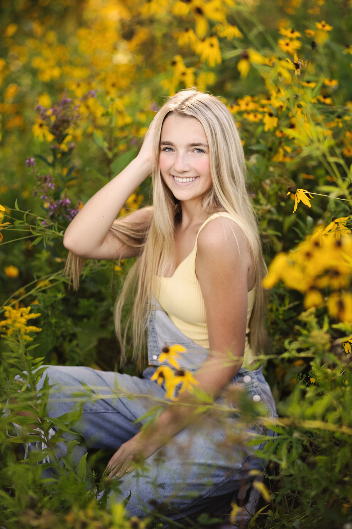 girl in field of flowers in eagan