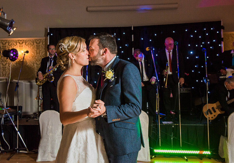 blonde bride kissing groom during first dance at the Dingle Skellig Hotel