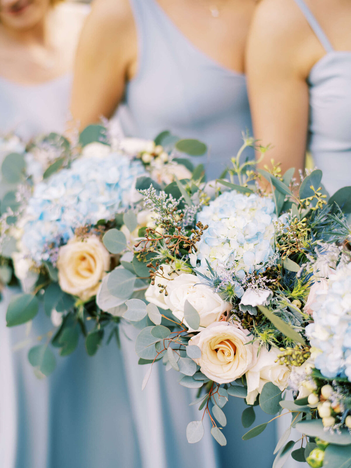 Blue hydrangea bridesmaid bouquets for central Texas wedding at Canyonwood Ridge