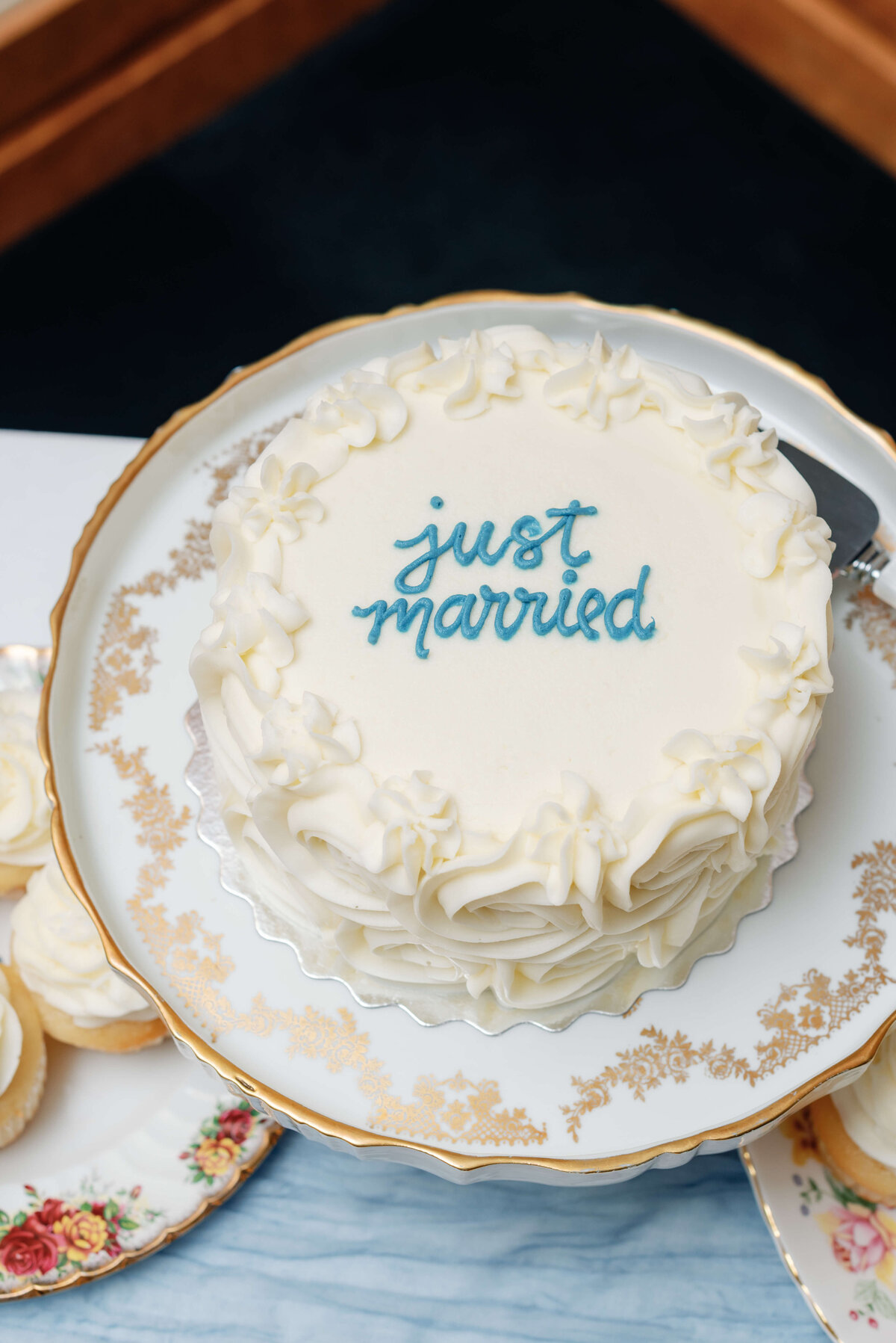Wedding cake with the words just married written on it at Oak Island Resort wedding, Nova Scotia
