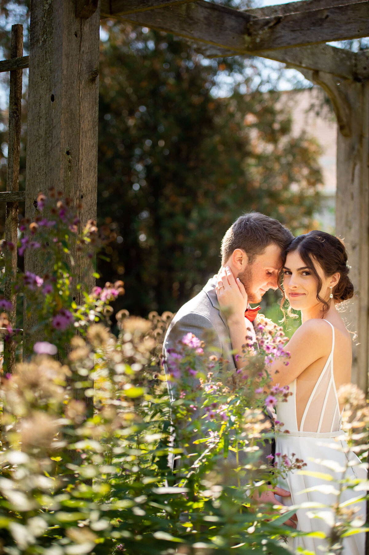 garden portraits of a bride and groom at Strathmere wedding venue in Ottawa