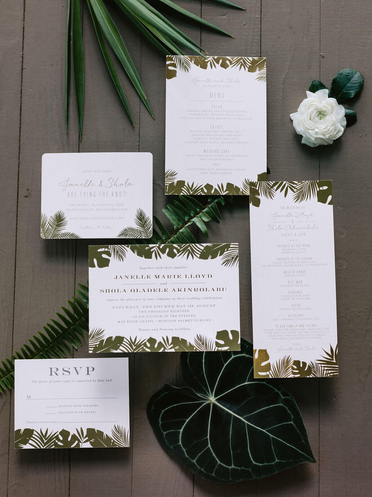 Elegant wedding invitation cards on a wooden table in Montage at Palmetto Bluff. Destination wedding image by Jenny Fu Studio