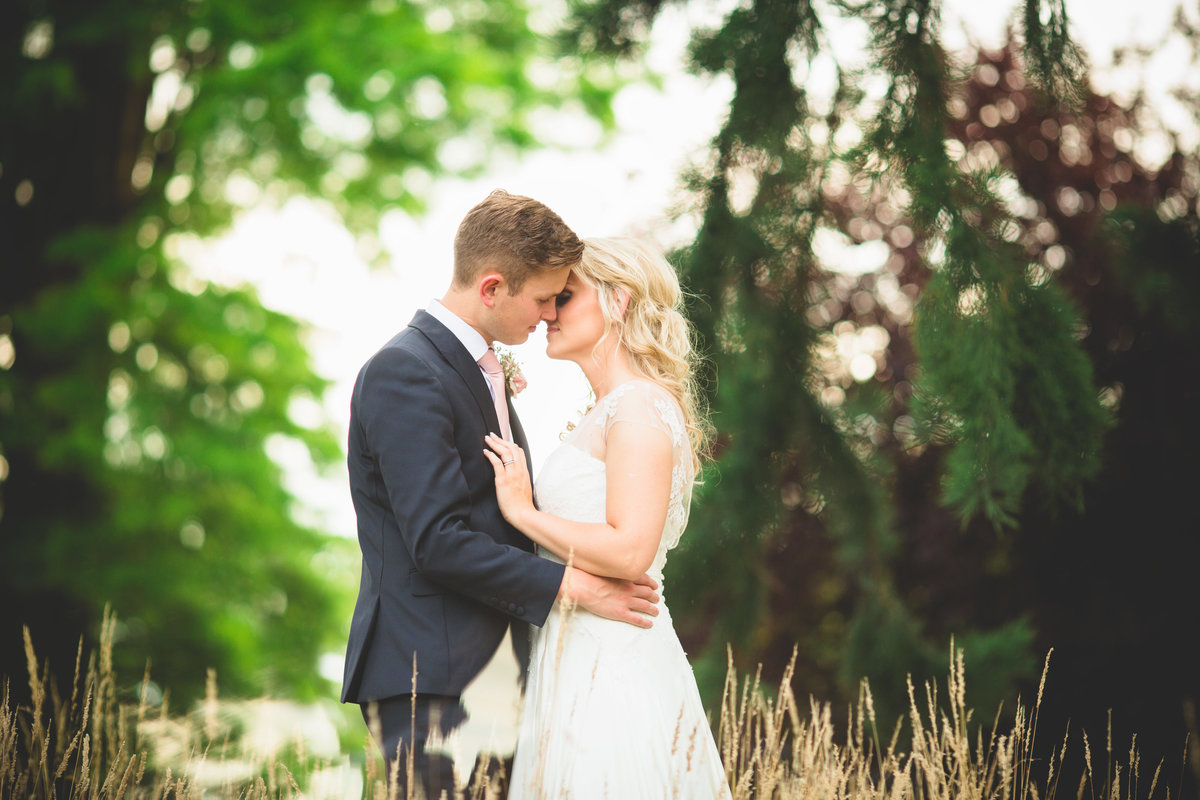 combermere abbey wedding photo in grass