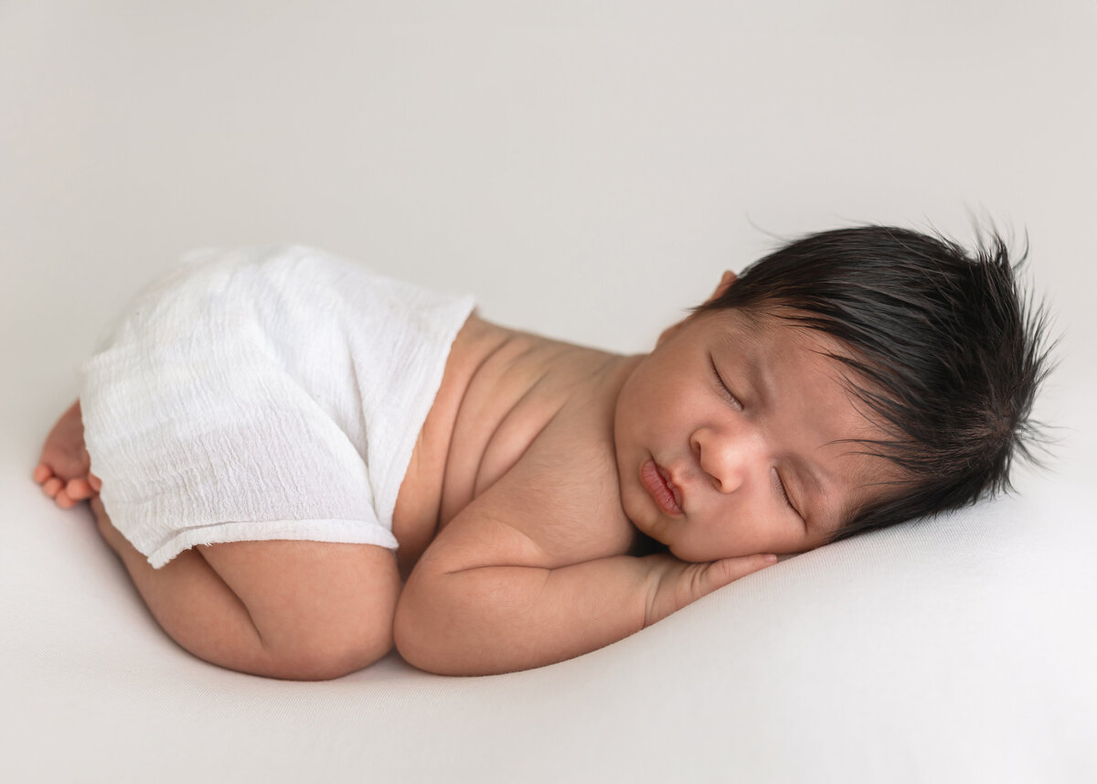 newborn boy with lots of hair