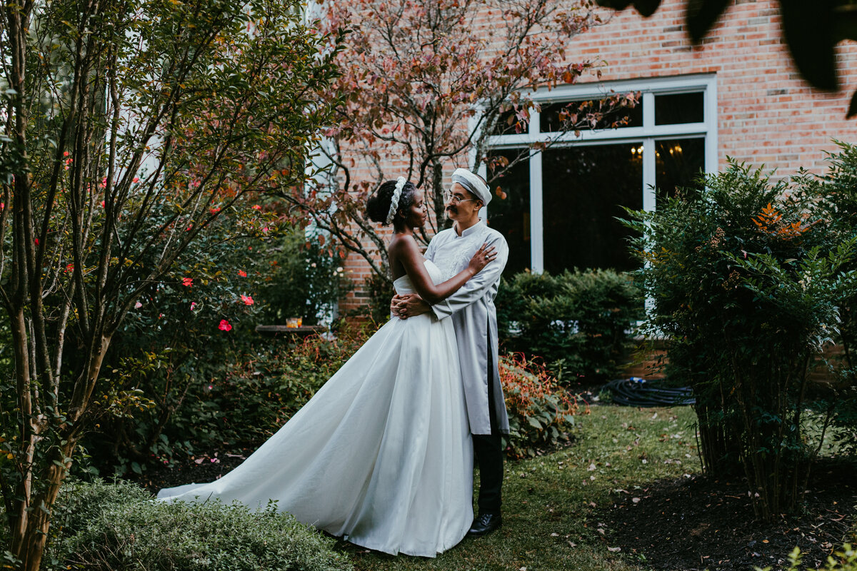 Bride and groom in a garden