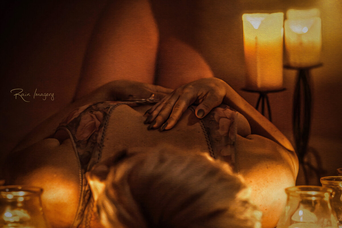 Candle Boudoir Image with lovely hand placement