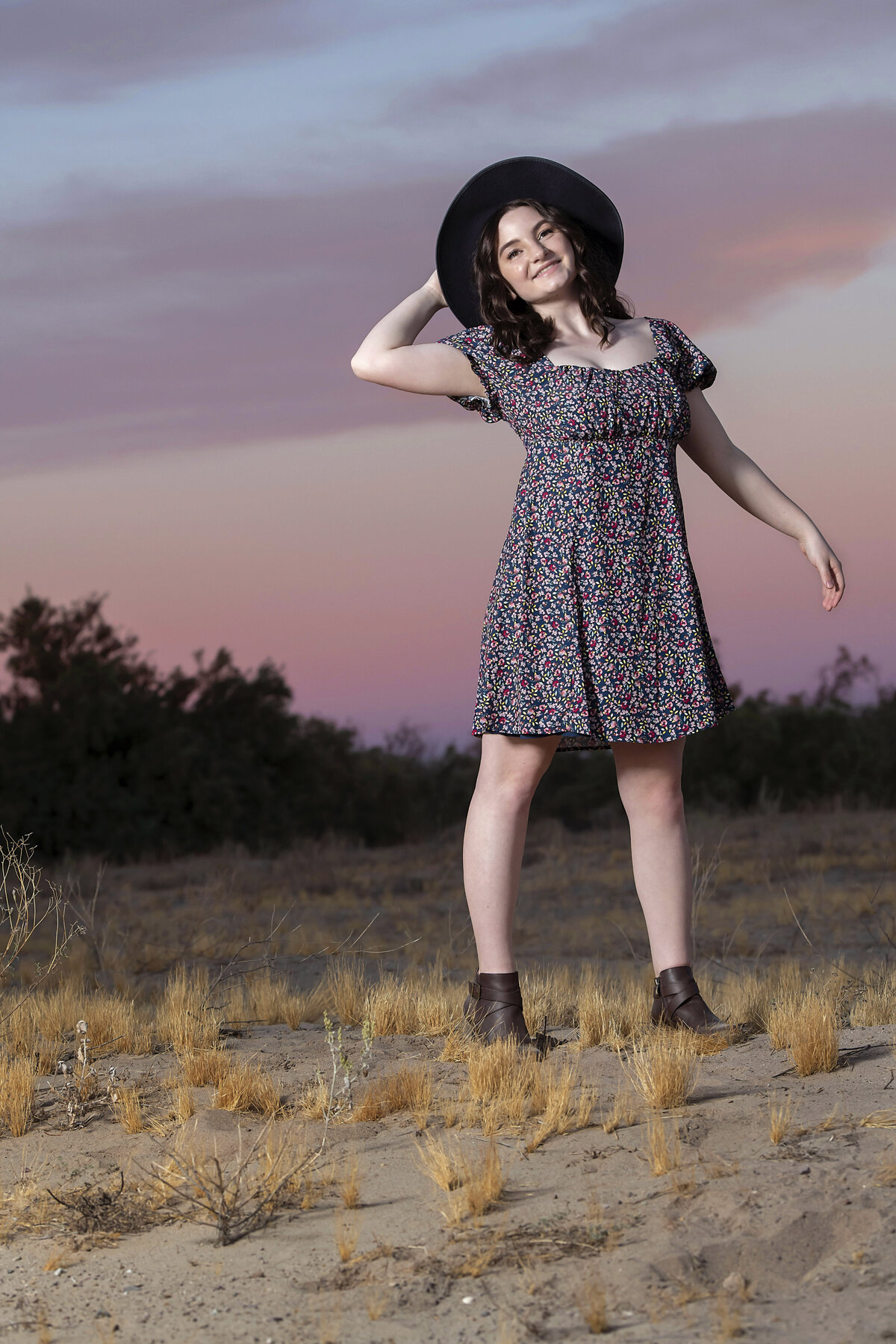 girl with hat in desert