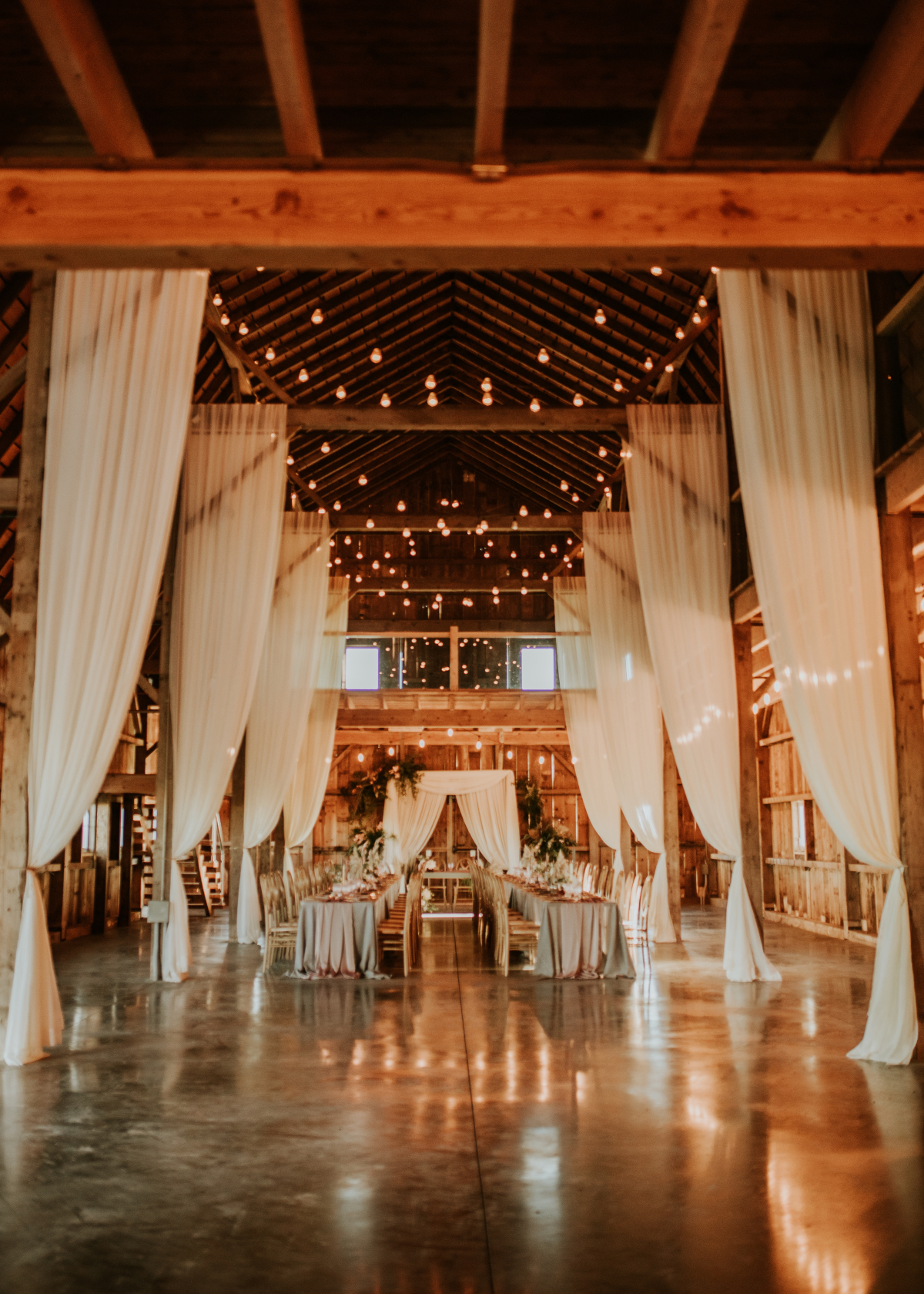 Elegant and romantic wedding reception decor at Countryside Barn, rustic, country Lethbridge, Alberta wedding venue, featured on the Brontë Bride Vendor Guide.