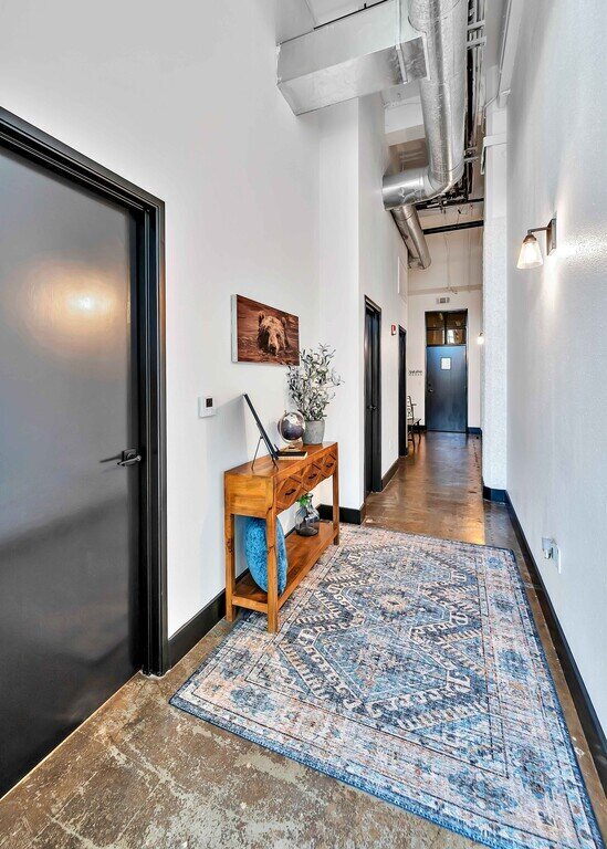 Front entrance of this industrial two-bedroom, two-bathroom first floor rental condo in the historic Behrens Building in downtown Waco, TX.