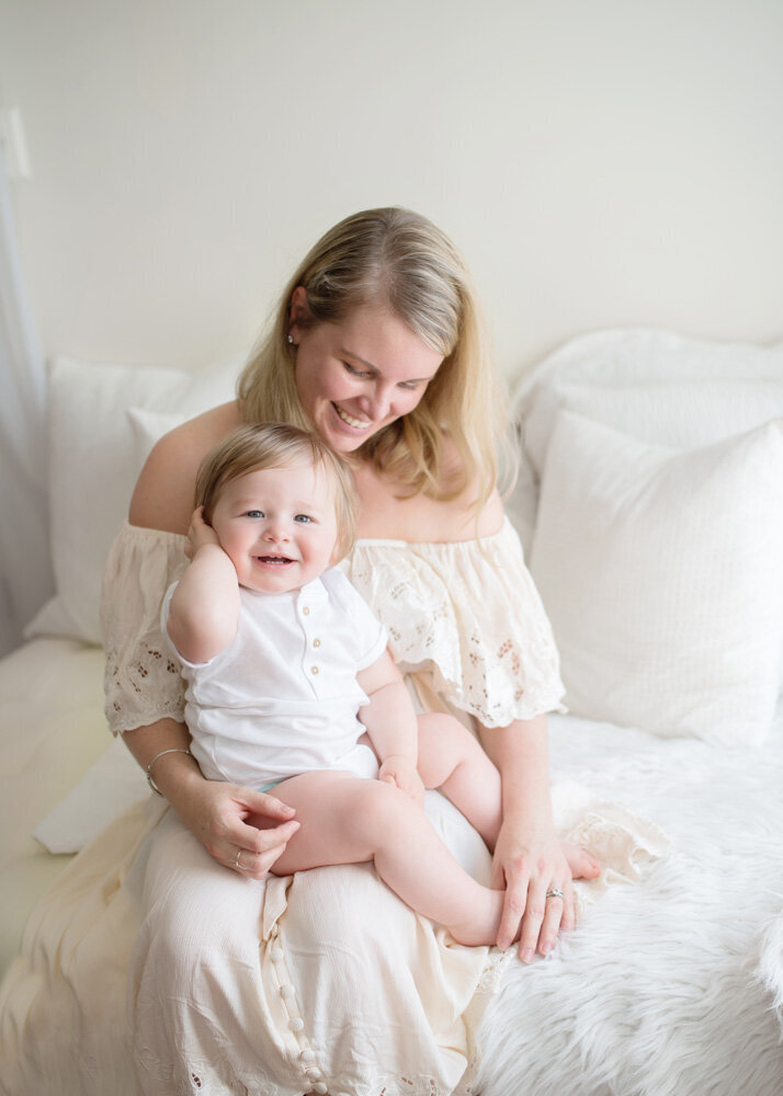 Family session of little boy and mother in a dress