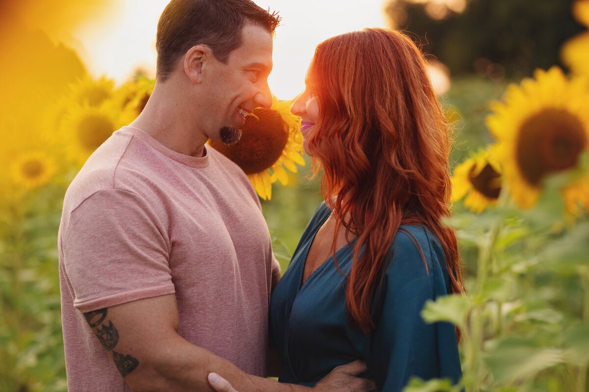 couple in sunflower field