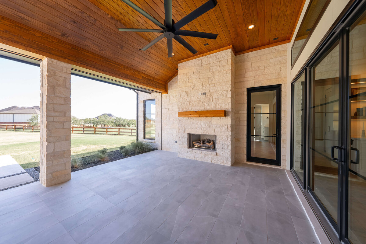 Outdoor living area with stone accents near Southlake, Texas