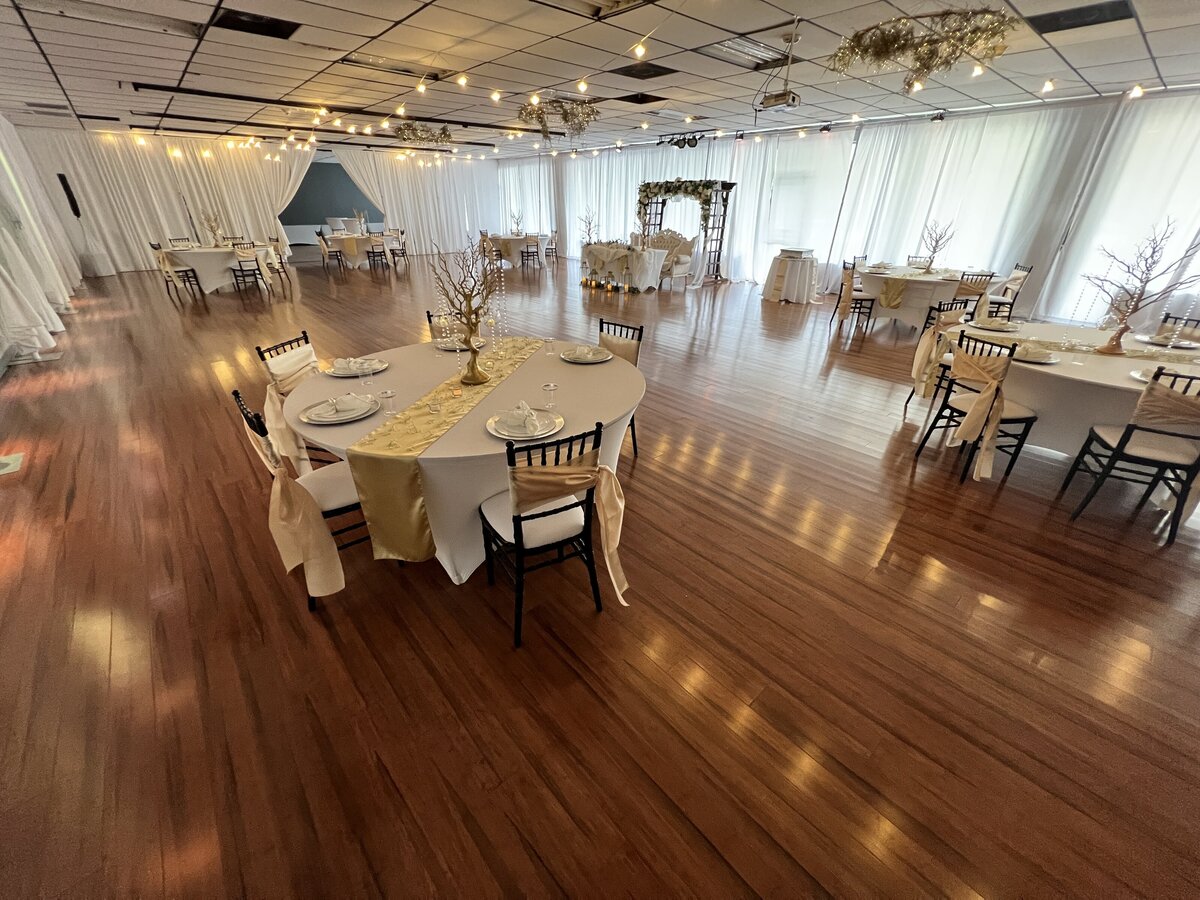 Elegant wedding reception in our indoor Clearwater event venue, adorned with our inclusive decor packages - Creating a stylish and memorable celebration