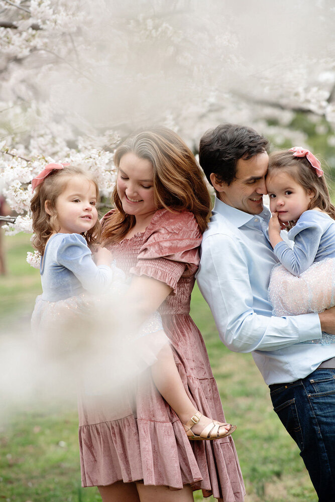 Family session of two little girls and their parents