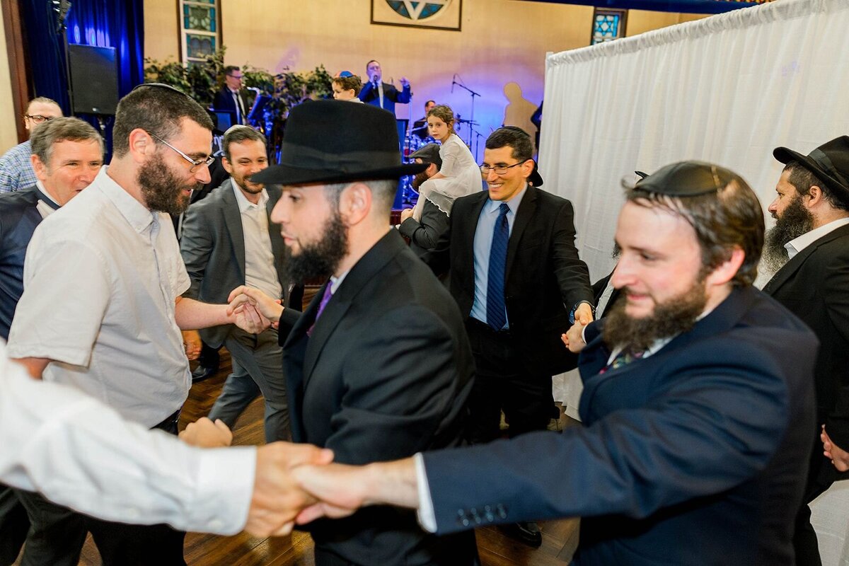 Eliana-Melmed-Photography-Chicago-LosAngeles-Jewish-WeddingPhotographer-CarmiKalman-MensDancing-00016