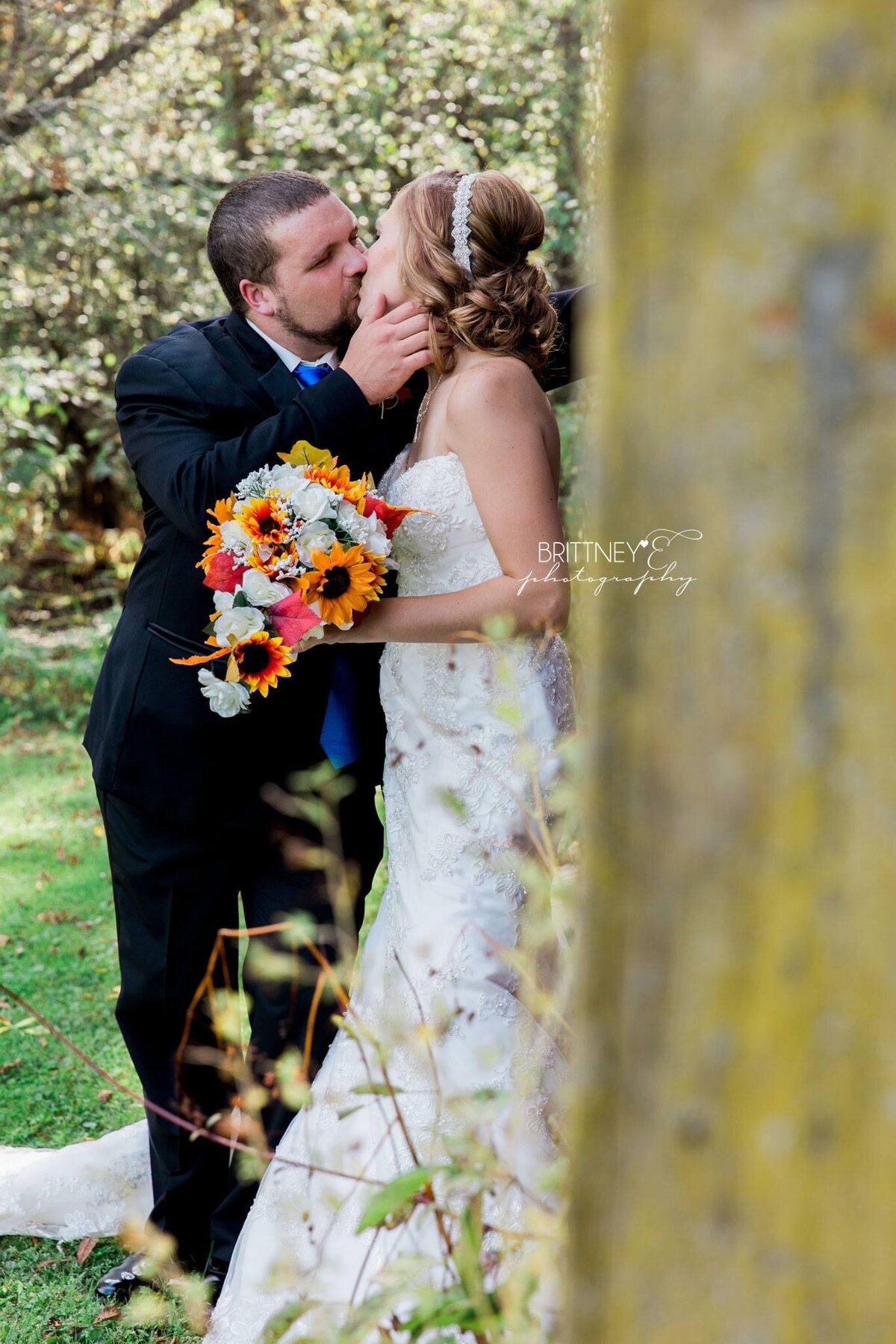 wausau photographer captures bride and groom kissing