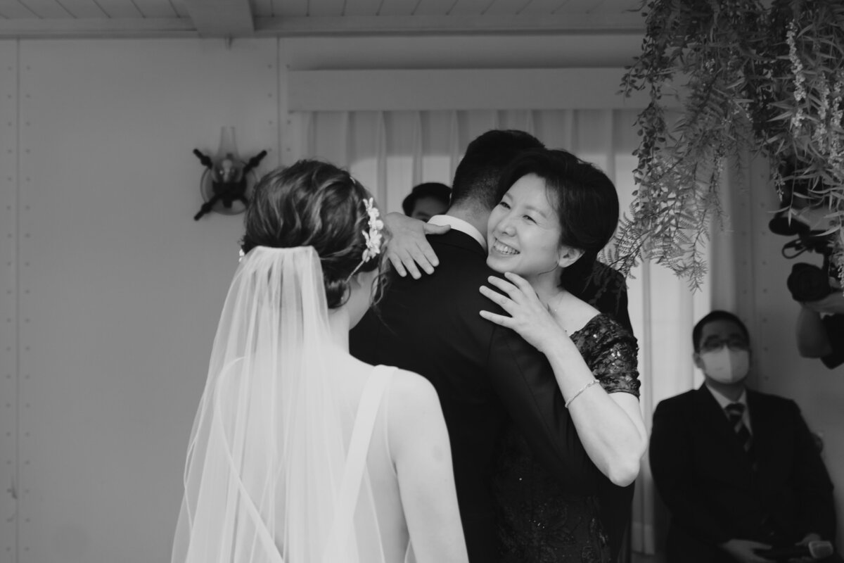 the groom hugging his mother