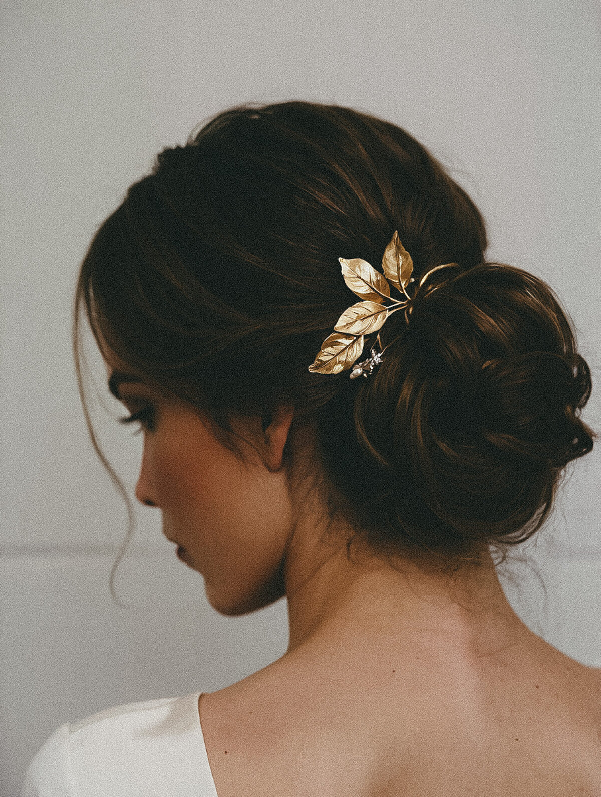 Elegant Updo with Gold Hairpiece