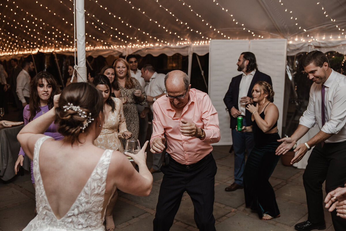 Bride dancing with her grandfather