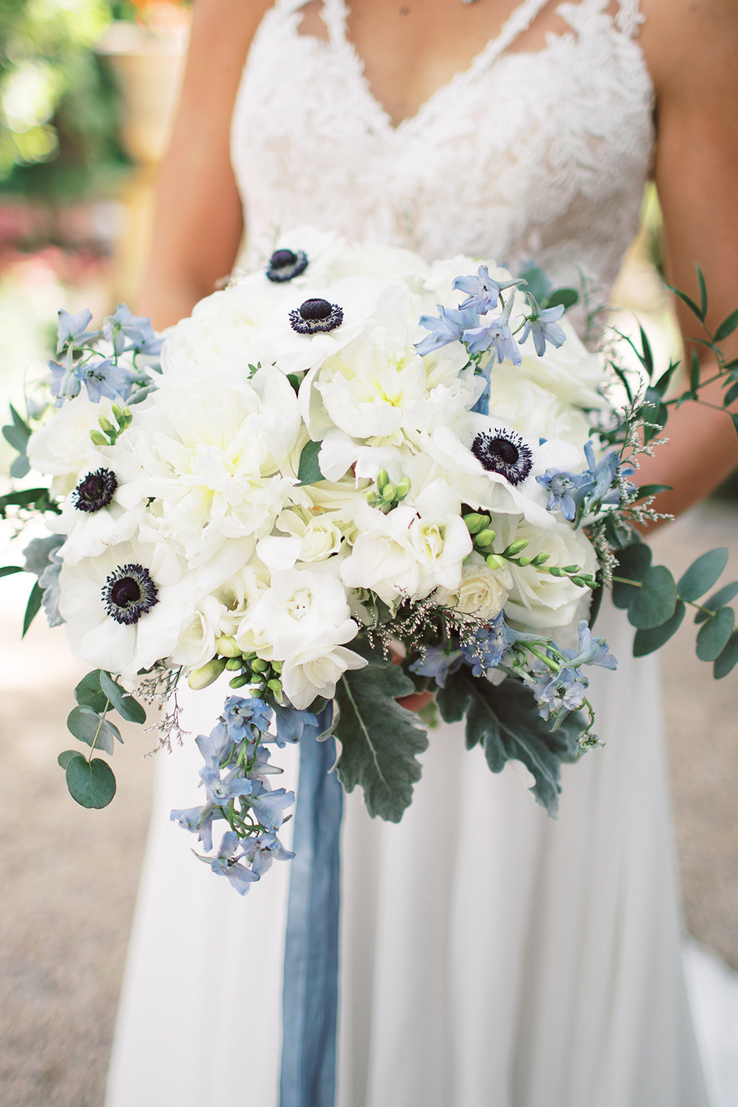 Close up of blue and white bridal bouquet