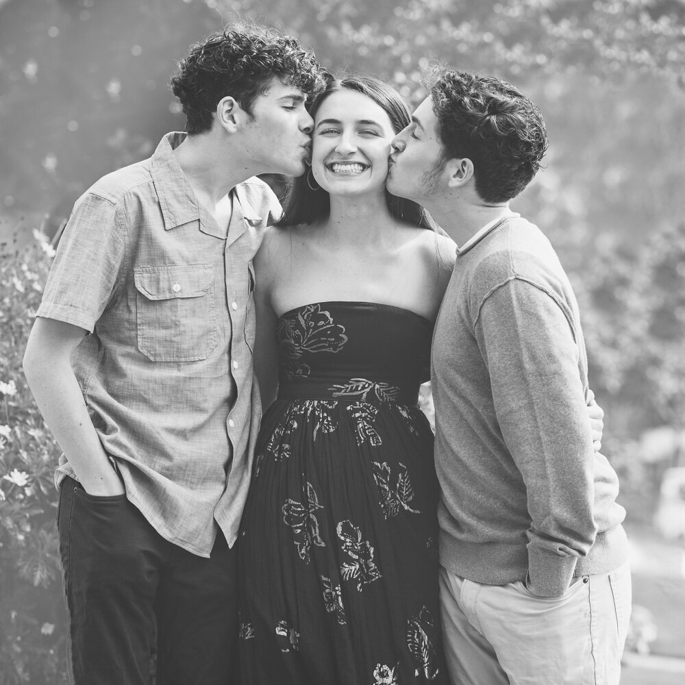 black and white brothers kissing sisters face