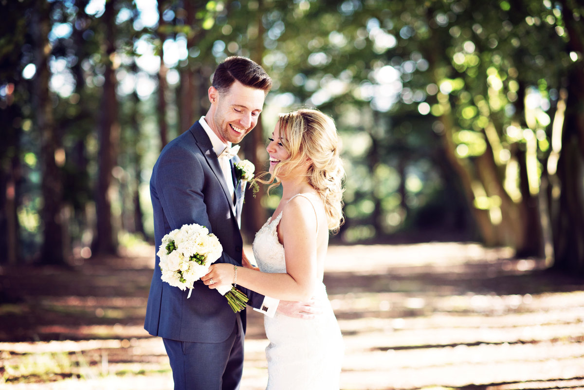 A Bride and Groom in the woods at Nunsmere Hall