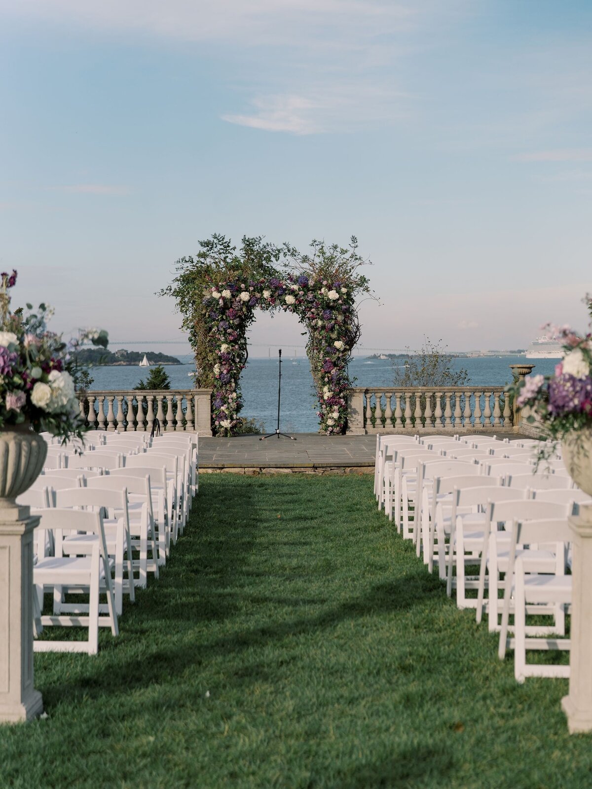 Catle Hill Inn wedding ceremony with large floral arch
