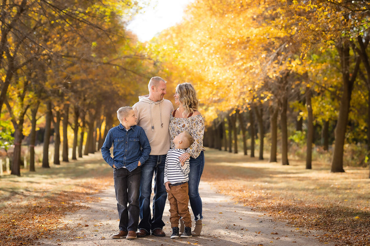 Family portrait session amongst the beautiful fall colors in Southern Minnesota.