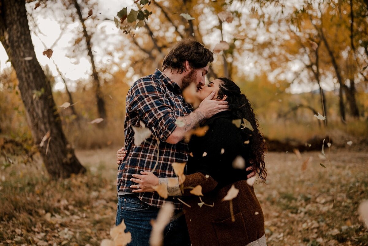 Couple embraces at Brainard Lake during engagement photo session
