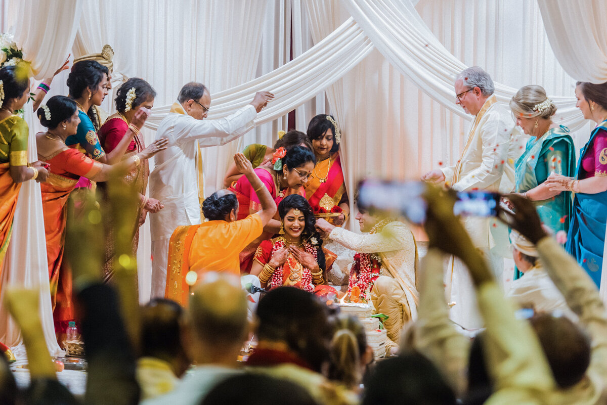 A candid moment during a traditional Indian wedding ceremony in Chicago