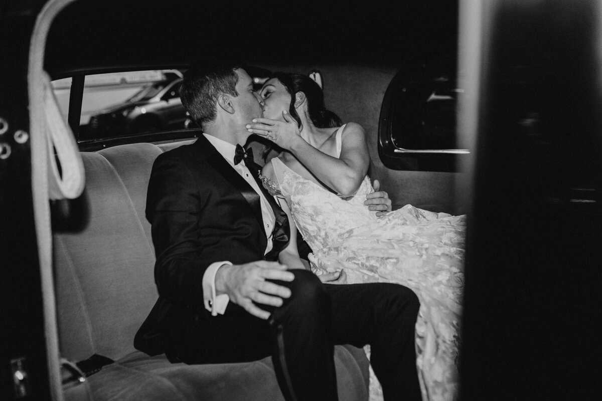 Couple kissing in car